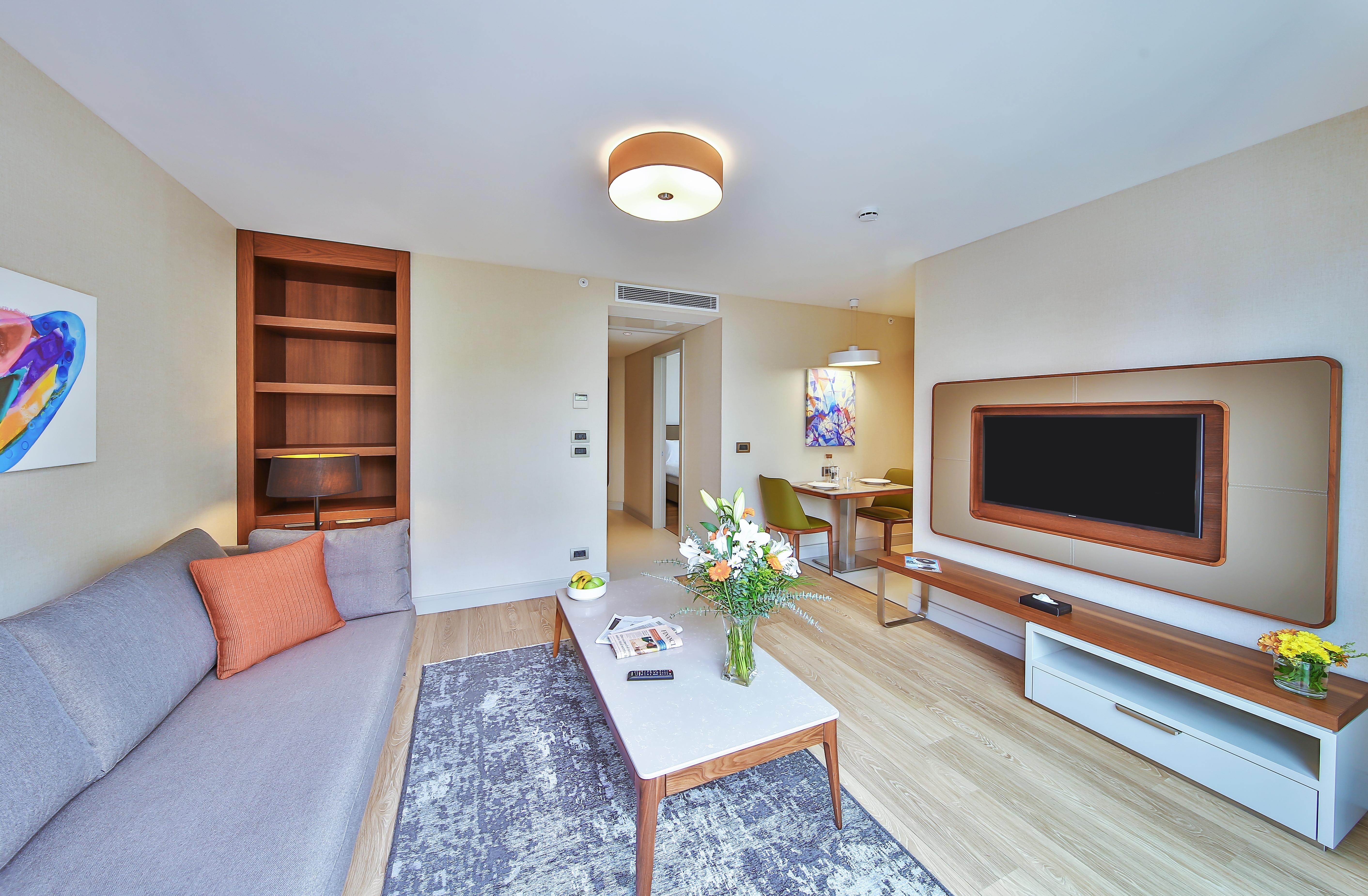 イスタンブール Tzl スイーツアパートホテル エクステリア 写真 A living room at the hotel