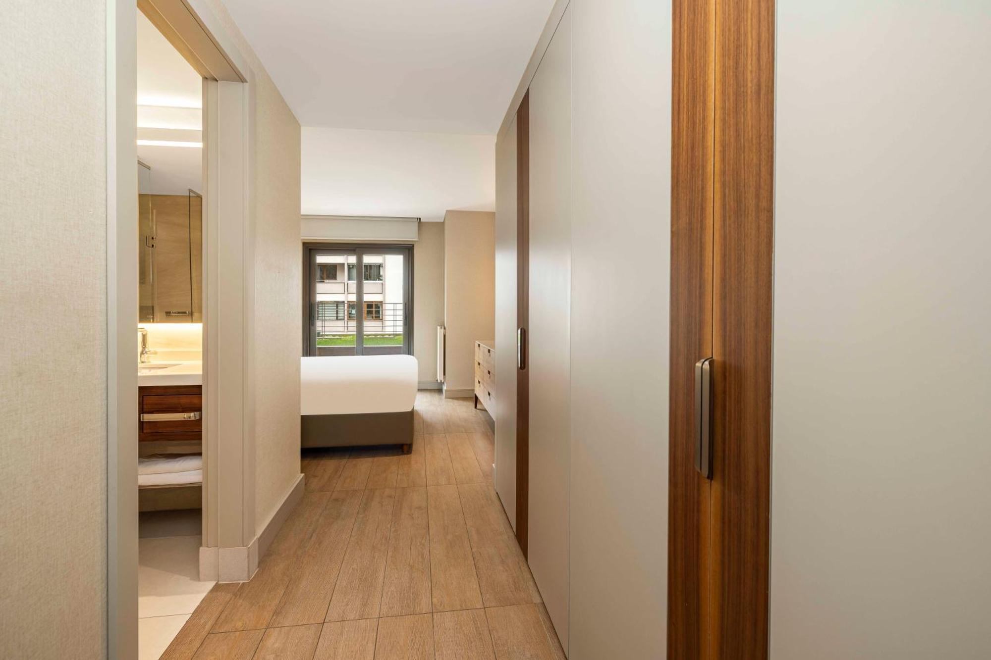 イスタンブール Tzl スイーツアパートホテル エクステリア 写真 A typical bedroom at the hotel
