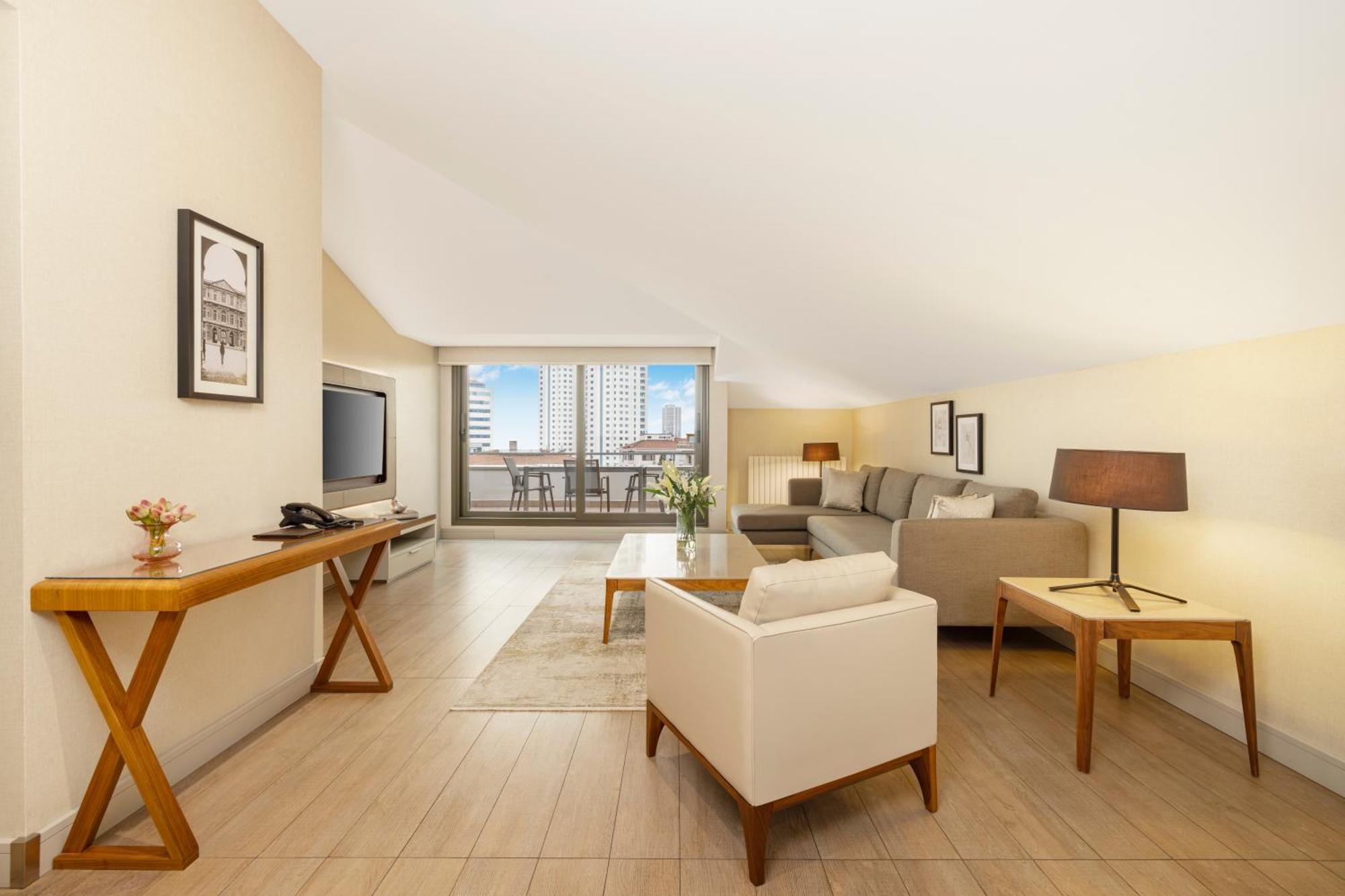 イスタンブール Tzl スイーツアパートホテル エクステリア 写真 A living room